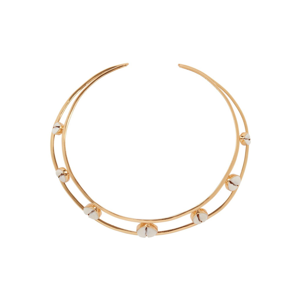 Gold and shell collar necklace on a white background